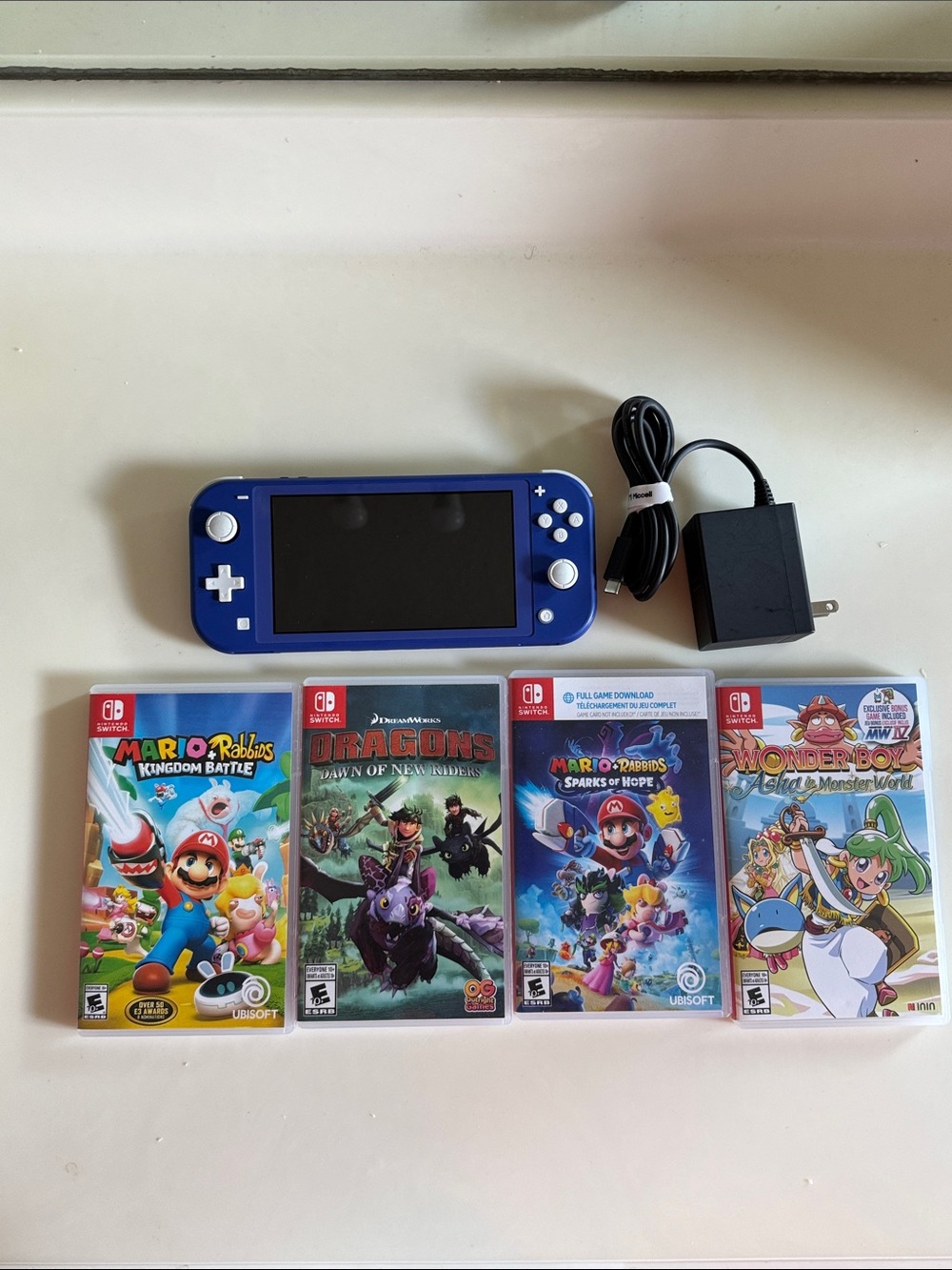 Nintendo Switch Lite 4 Games Mario Bundle